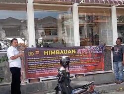 Cegah Judi Online di Warkop, Satreskrim Polresta Banda Aceh Pasang Spanduk Imbauan