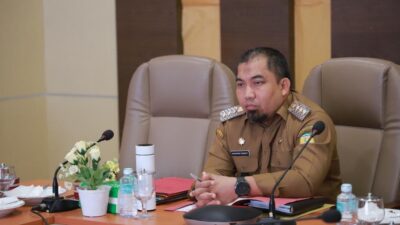Pj Bupati Aceh Besar Ikuti Rakor Pengendalian Inflasi Secara Zoom Meeting
