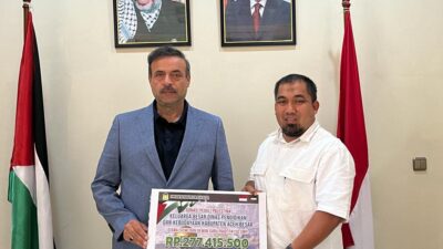 Pj Bupati Iswanto Serahkan Donasi Masyarakat Aceh Besar untuk Palestina