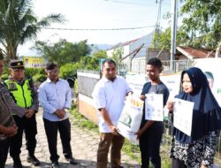 Pj Bupati Aceh Besar Salurkan Bantuan Pangan Kepada 3.389 KPM