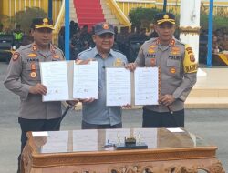 Pj Bupati Aceh Tamiang Pimpin Upacara Apel Siaga Satlinmas Pemilu 2024