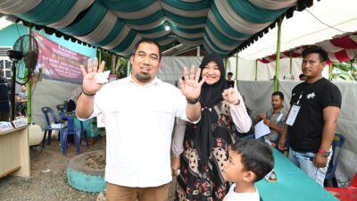 Pj Bupati Aceh Besar dan Istri Nyoblos di TPS 01 Gampong Gani