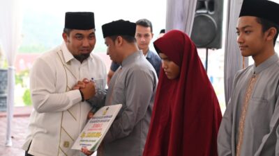 Pj Bupati Aceh Besar Serahkan Bonus Juara MTQ dan FASI