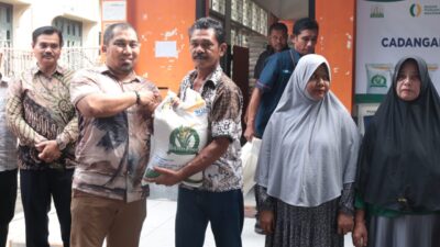 Pj Bupati Aceh Besar Salurkan Bantuan Cadangan Pangan Tahap II Kepada 2.876 KPM di Kecamatan Ingin Jaya