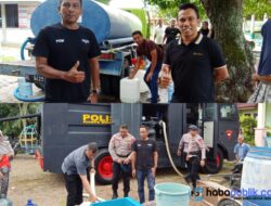 Sat Brimob Polda Aceh dan Perumdam Tirta Daroy Bantu Air Bersih untuk Warga Lhoknga