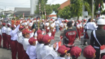 Ribuan Pelajar di Kota Lhokseumawe Antusias Sambut Kirab Api PON XXI
