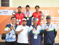 Pj Bupati Aceh Besar Kalungkan Medali Cabor Paralayang PON XXI Aceh-Sumut