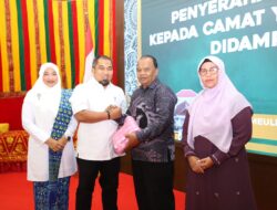 Pj Bupati Aceh Besar Lepas Purna Tugas Camat Baitussalam