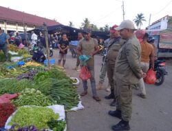 Pasca Lebaran Idul Fitri, Personel Satpol PP dan WH Aceh Besar Disiagakan di Pasar Induk Lambaro