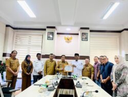 KIP Sabang Serahkan Laporan dan Penghargaan Pilkada 2024