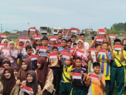 DPD SWI Aceh Barat Bagikan Ratusan Bendera Merah Putih Kepada Pelajar