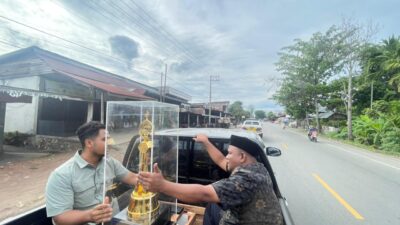 Kafilah Aceh Besar Arak Piala Bergilir MTQ ke-37 Aceh dari Saree Hingga Dekranasda