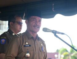 Pembina Apel HUT Satlinmas ke-64, Wabup Aceh Besar Minta ASN Tingkatkan Disiplin Kerja