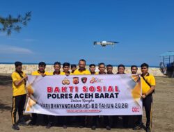Sambut HUT Bhayangkara ke-80, Satreskrim Polres Aceh Barat Gelar Bakti Sosial Bersih Pantai dan Sekola